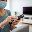© Анна Далингер - tv remote control in hand