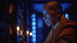 © IllustrationAlchemy - Buddhist monk examining glowing network servers in a data center with candles.