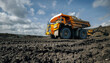 © Parilov - Massive dump truck at open pit coal mine under blue sky