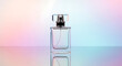 © Ahsanul - Clear glass perfume bottle with black cap on colorful gradient background transparent background