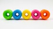 © Mazlan - Brightly Colored Urethane Skateboard Wheels in Row