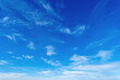 © Dmitrii Labrador - Blue sky with white clouds soft atmospheric background natural skyscape clear weather airy environment minimal scene tranquil daylight backdrop