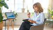 © SolaruS - Confident businesswoman analyzes market trends on her tablet in a sunlit home office filled with plants. A visual metaphor for growth, digital success, and modern professional lifestyle.