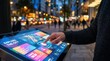 © Masque - A hand engaging with vibrant digital signage on a touchscreen for an interactive user experience.