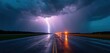 © miss irine - Thunderstorm strikes airport runway at night. Wet asphalt reflects orange lights. Dark clouds loom. Lightning illuminates the stormy sky above. Aviation safety concerns.