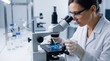 © Benjamin - Female scientist in lab coat examining biological sample under microscope in modern laboratory, medical research and biotechnology innovation for healthcare and pharmaceutical