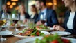 © Vadym - Professionals dine in upscale restaurant. Colleagues enjoy salmon salad and wine at table. People have business lunch meeting in modern eatery, discussing work matters.