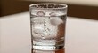 © faisal - Chilled glass of water with ice cubes and condensation, refreshing cold beverage in a clear tumbler, pure mineral water for hydration and health