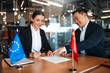 © Valerii Apetroaiei - Diplomatic negotiations between countries in the office