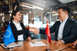 © Valerii Apetroaiei - Diplomatic negotiations between countries in the office