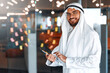 © Valerii Apetroaiei - Arab male businessman in office