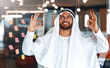 © Valerii Apetroaiei - Arab male businessman in office
