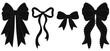 © John - Four different black ribbon bows including a large ornate bow and a smaller simple bow are arranged in a row decorative gift present elegant celebration accessory craft design
