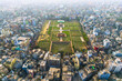 © AmazingAerialAgency - Dhaka, Bangladesh - 08 March 2026: Aerial view of Lalbagh Fort with its symmetrical gardens and historic red brick architecture surrounded by the dense urban skyline of Dhaka.
