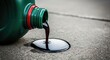 © aldi - Dark oil pouring from a green bottle, forming a sleek puddle, on rugged concrete, industrial backdrop, contamination Concept.