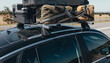 © Nadya - Car with Roof Rack Loaded with Luggage for Road Trip Travel