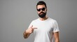 © udiana - Confident Man with Beard and Sunglasses Pointing to Himself Against a Gray Studio Background