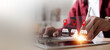 © kunakorn - Small business store finding and location based service concept with businessman touching virtual shop icons on tablet.