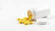 © rahwik - yellow oval tablets with opened white bottle on white background medicine health concept
