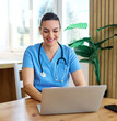 © Lumos sp - Portrait of a young nurse getting ready for work and using laptop online meeting at home. Overworked, busy, stress, urgency, multitasking concepts