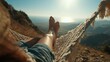 © DSimage - Relaxed woman lying in hammock on mountain cliff at sunset, legs and feet close up with scenic coastline and sea view in soft warm light.