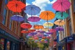 © Jdgkxbnc - colorful hanging umbrellas forming a cheerful canopy over a sunlit narrow street lined with brick buildings and shopfronts