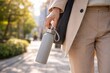 © snowdrop - Person Holding Reusable Bottle While Walking