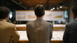 © forenna - Government auditors in grey suits examine large printed AI governance compliance charts pinned to office walls, regulatory inspection afternoon, policy enforcement, federal technology oversight, bur