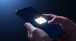 © Mst. Safali Sultana - Person holding smartphone with glowing email notification icon on screen
