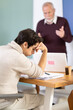 © JackF - Senior man head of department shouts at guy subordinate who is doing work deskbound job in office. Reprimand from superiors, hardships of internships, complaints and dissatisfaction of superiors...