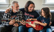 © Gianpiero - Three generations of Caucasian men sitting on the sofa with electric guitar, family bonding and musical passion