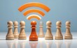 © joeycheung - Wooden chess pawns one central orange pawn under Wi-Fi signal symbol.