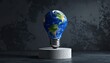© ruangrit19 - A conceptual 3D render of a light bulb shaped like the planet Earth standing on a stone pedestal representing global energy conservation.
