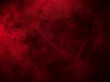 © Presiyan - Intense deep red smoke swirling against a stark black background, creating an abstract and moody texture.