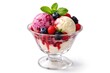© AkuAku - Berry and vanilla scoop ice cream sundae decorated with mint leaves on plain white background