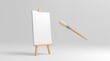 © Ayimonin Materials - Blank canvas on wooden easel with floating paintbrush creativity concept