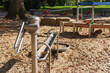 © Aleksandr Fedosov - Children playground sand area with metal slide and water play equipment