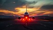 © Anjali - Airplane on runway during dramatic sunset with glowing sky commercial aircraft travel aviation transport concept cinematic landscape scene