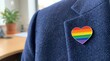 © Alex Pios - Rainbow Stripe Heart Pin Badge, Smart Casual Jacket, Close Up, Minimal. LGBTQ+ Pride Month at Work. Equality, Diversity, Human Rights. Awareness, Social Responsibility, Entrepreneur, Manager, Employee