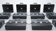© Naila - black briefcases chained together in rows on white background