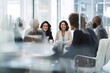 © gankevstock - Diverse business team in a modern office meeting room, smiling and collaborating