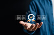 © Kiattisak - Person holding quality assurance certification and document digital icon. Compliance and standard business concept.