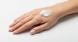 © Maryia - Qualified technician precisely applies hand cream to specially prepared areas of skin after manicure. provides effective hand care, manicure aftercare with cream, polished beauty grooming