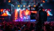 © ABDURRAHMAN - professional camera captures a vibrant event scene illuminated by colorful lights, showcasing a dynamic atmosphere with an audience