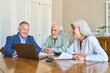 © Robert Kneschke - Retirement Planning And Financial Protection: Senior Couple Receiving Professional Advice From Advisor On Laptop For Long-Term Security