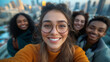 © Dimas - Friends celebrate world friendship day with joyful selfie on city rooftop