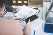 © Kansuda - Accounting company provide finance and taxation planning for profitable cash flow, Auditor accountant working in office, analyze financial data and accounting record with calculator