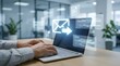 © salim - Hands typing on laptop with digital email and communication icons
