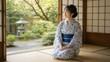 © AiPhoto - 和室の縁側から日本庭園を眺め微笑む浴衣姿の女性のデート