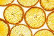 © ADDICTIVE STOCK - Close-up orange slices background with bright citrus texture